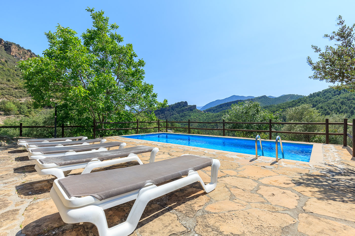 The pool area is private and enjoy great views